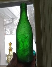 GREEN E.L.KERNS TRENTON,NJ SCRIPT EMB ELK HEAD HAND BLOWN EARLY 1900 BEER BOTTLE