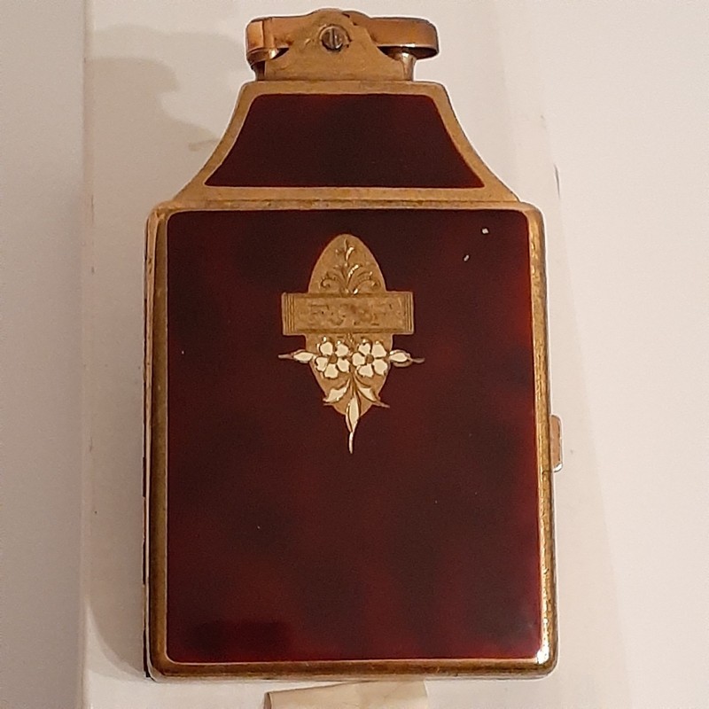 Ronson mastercase cigarette case lighter. Dureum and tortoise enamel w/flowers.