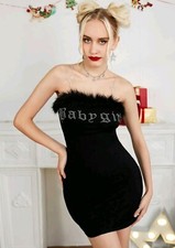 Bodycon dress with letter rhinestones.  Plush trim.Not transparent.