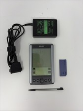 Sony CLIE PEG-S300/E Handheld Palm Powered 8MB Memory Stick Working with Charger