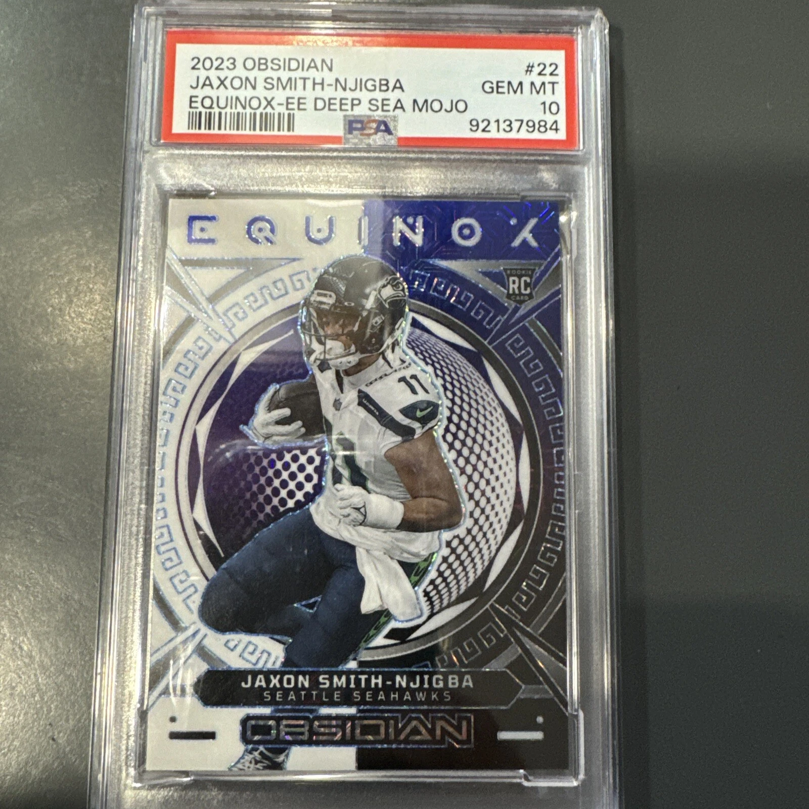 Jaxon Smith-Njigba Panini Obsidian Equinox #22 Electric Etch Deep Sea Mojo