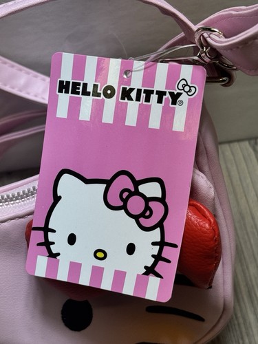Neu mit Etikett Hello Kitty Face Sanrio rosa mit roter Schleife Kunstleder Umhängetasche Handtasche - Bild 2 von 8