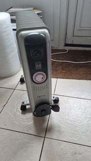 NETTA 2500W Oil Filled Radiator Heater 11 Fin Thermostat 24H Timer VGC