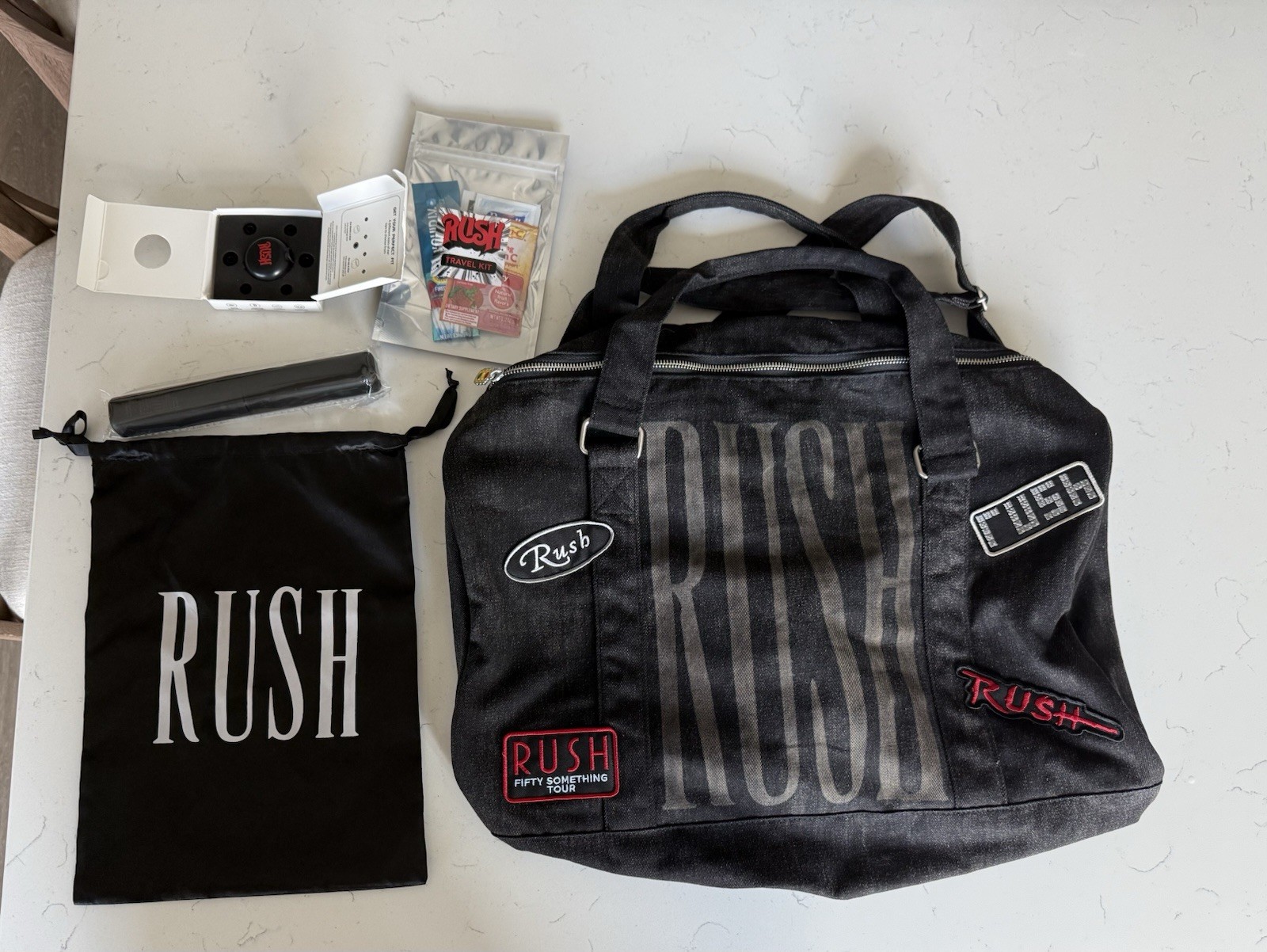 Rush fifty something tour duffel bag ear protectors travel concert merchandise
