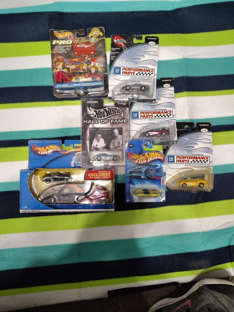 various hot wheels collectibles(hallow fame pavement pounder GM and out crew)