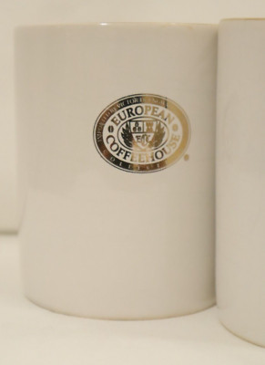   European Coffeehouse Coffee Mug Pair (2) 8oz White, Gold Trim.