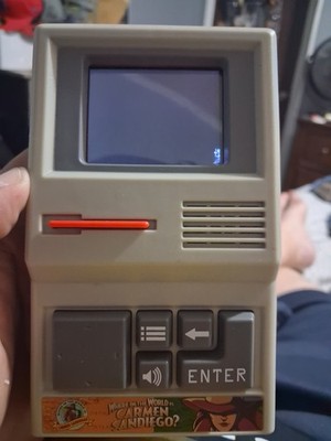 Basic Fun Where in The World Is Carmen Sandiego Handheld Electronic Game - 09613