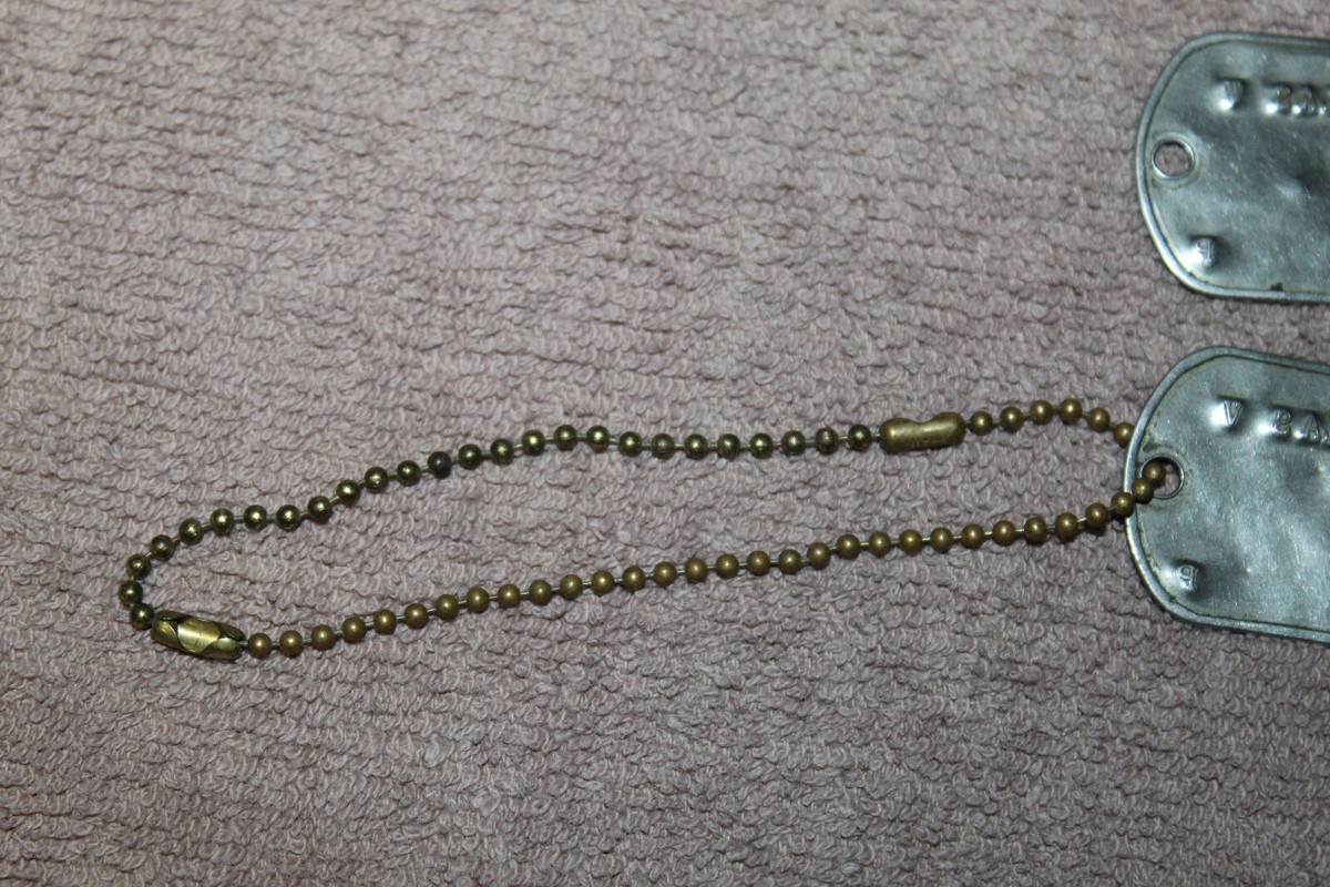 Original Pair of 1954 dated U.S. Army Soldier's Dog Tags & Short