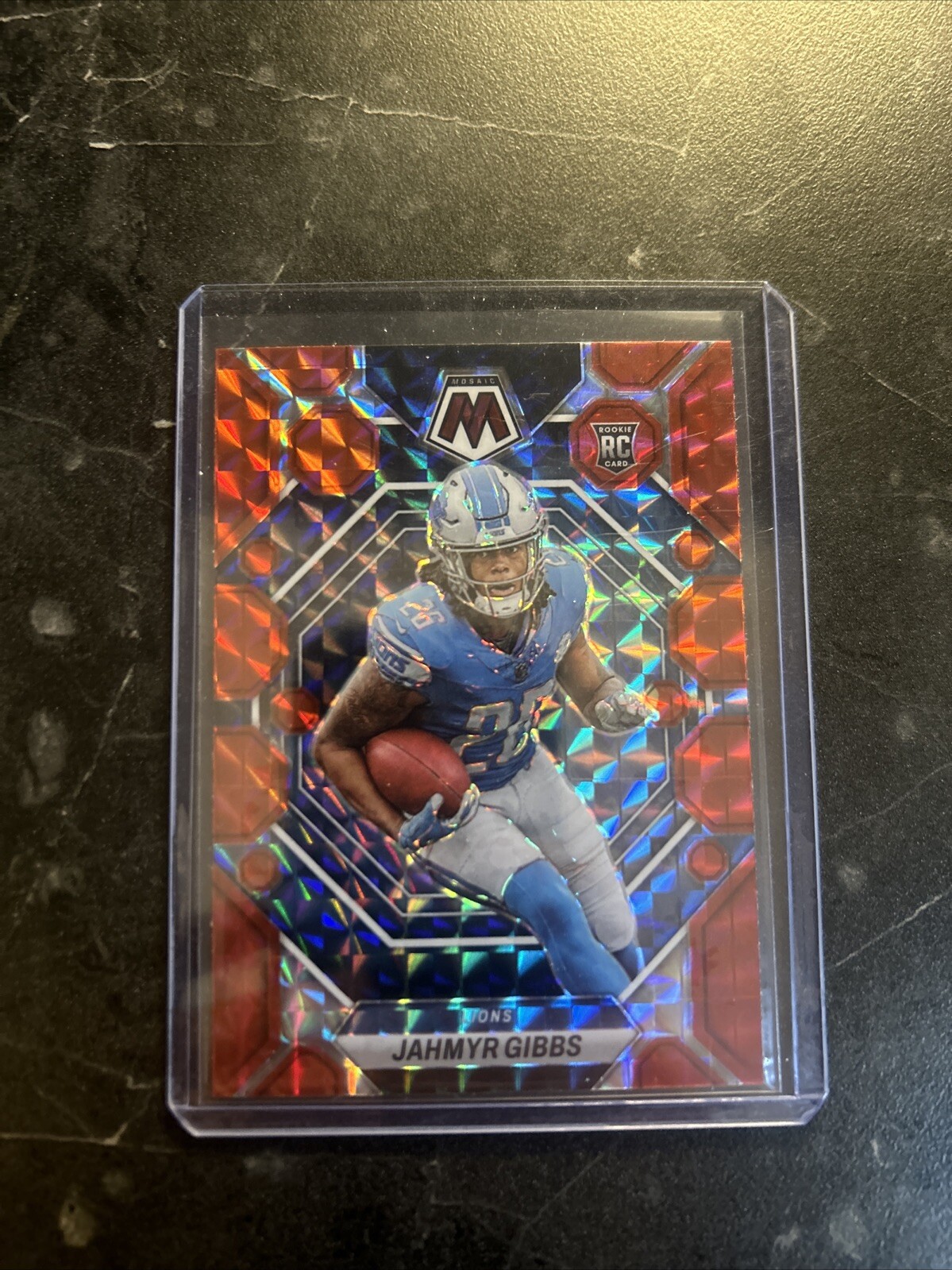 2023 Panini Mosaic - Rookies Red Mosaic Prizm #324 Jahmyr Gibbs (RC)