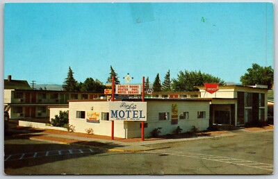 Ellensburg Washington view from street of Rega Lodge Motel vintage postcard unp
