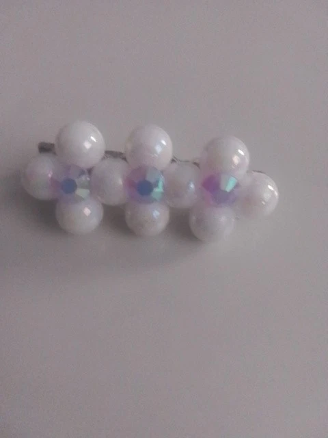 Una pinza de pelo hecha a mano con cuentas muy hermosa con detalles de pedrería púrpura Foto 4 de 4