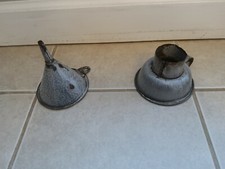 Antique gray graniteware funnels