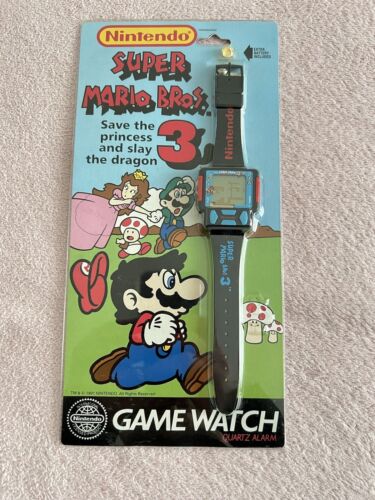 Montre de jeu Zeon Nintendo années 1990 rare Super Mario 3 très bon état dans sa boîte - Photo 1/6