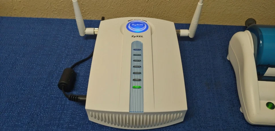 Router punto de acceso inalámbrico ZyXel Zyair G-4100 v2 con impresora SP-200E Foto 3 de 4