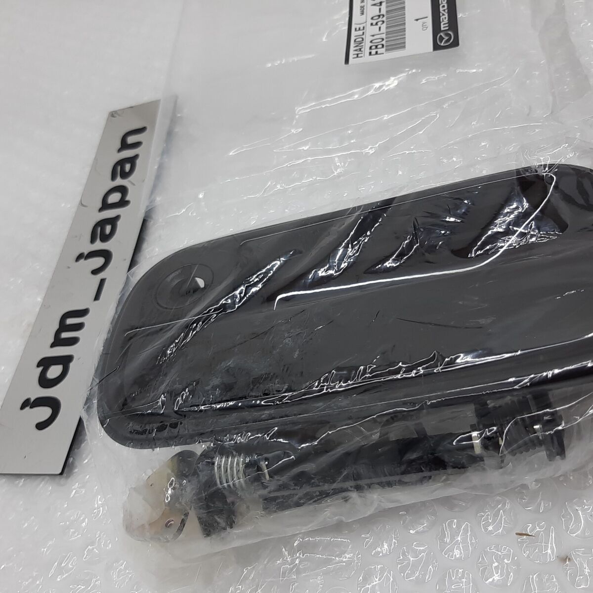Mazda 86-92 RX-7 FC3S Outer Black Door Handle Left Genuine Mazda 86-92 RX-7 FC3S Outer Black Door Handle Left Genuine