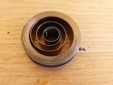 MOLLA DI RICAMBIO PER GRAMMOFONO OROLOGIO  25x70 mm ATTACCO CENTRALE CON PIEGA