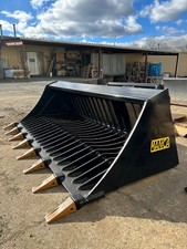 74'' skid steer skeloton bucket severe duty by MANCA THUMBS
