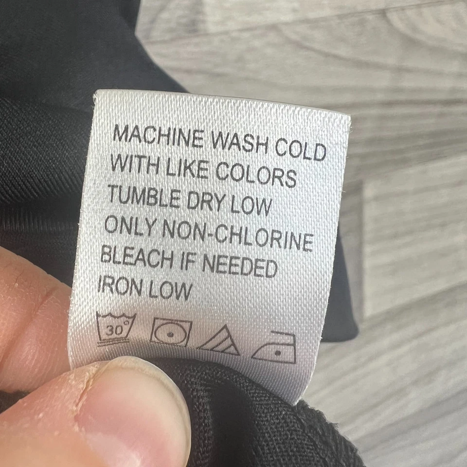 Top de golf Tail para mujer pequeño negro estampado de leopardo cuarto cremallera rendimiento pulóver Foto 4 de 4