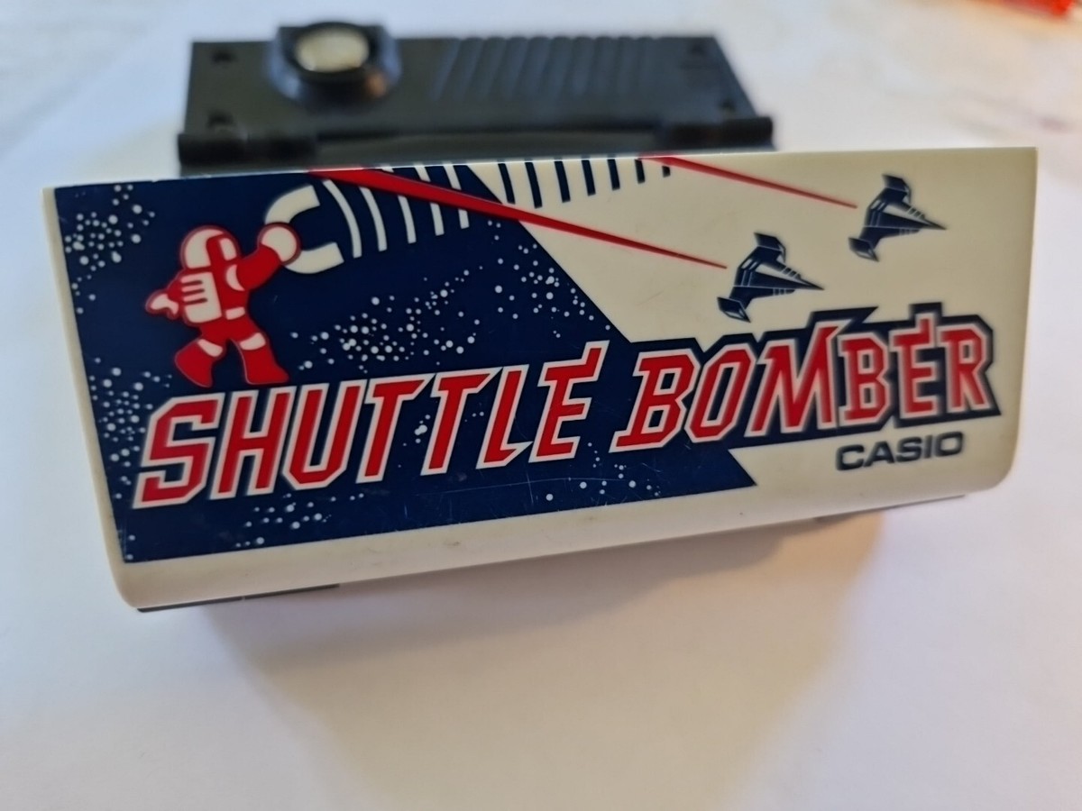Casio 1983 CG-70 Shuttle Bomber Electronic Handheld Video LCD Game