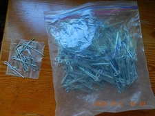 Bag of 114 metal slide-on drapery hooks (with 8 single drapery pins as bonus)