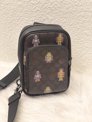 COACH CW317 Cosmic Racer Sling Pack Signature Robot Print