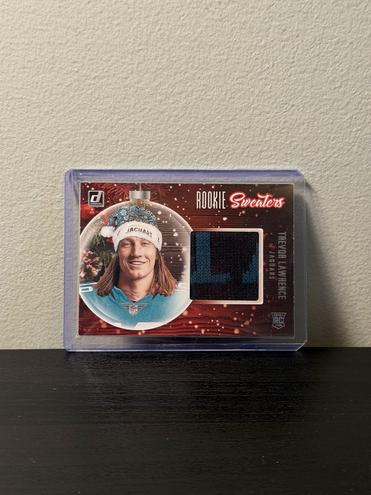 Trevor Lawrence Panini Donruss Rookie Holiday Sweater Memorabilia #RSTRL Base