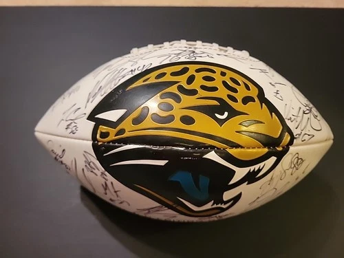 2010 OR 2011 JACKSONVILLE JAGUARS TEAM SIGNED LOGO FOOTBALL - SLOW LEAK