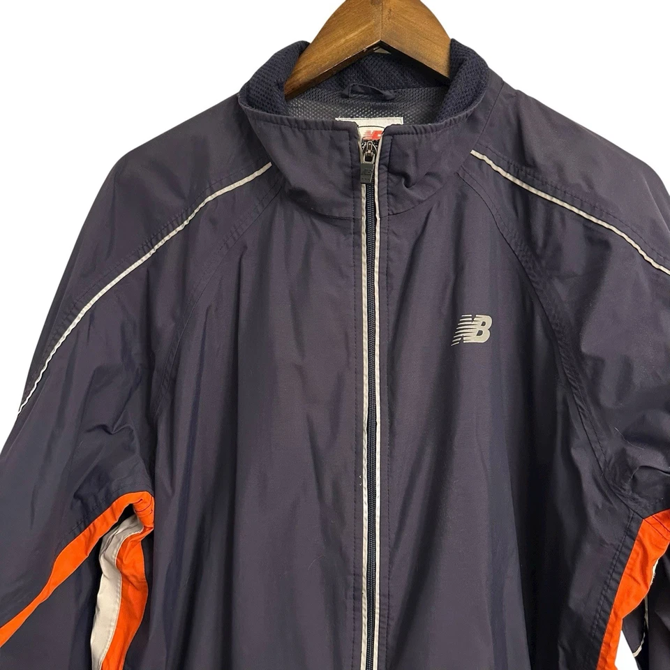 Chaqueta cortavientos New Balance vintage forrada con cremallera completa azul marino naranja grande para hombre Foto 3 de 4