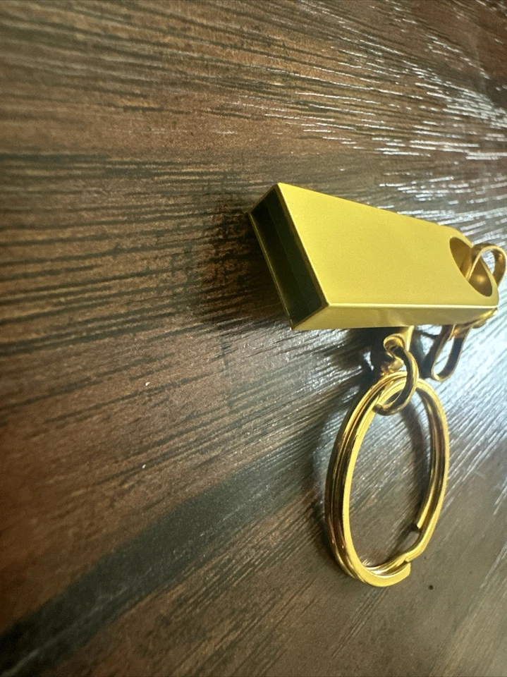Unknown Amount Of Storage Gold Keychain Hard drive, With USB To C Adapter Piece. - Image 2 of 4