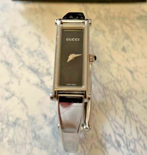[OCCASION Excellent] Montre femme Gucci 1500L argent cadran noir 15,5 16 cm sans boîte F/S