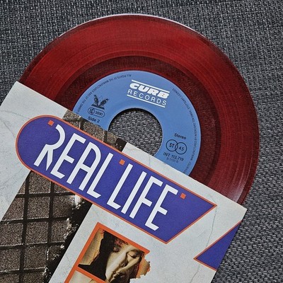 Real Life   Face to Face (1985)   7'' Single rotes Vinyl Curb INT 112.719   EX