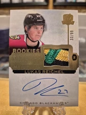Lukas Reichel RPA /99 2022-23 The Cup Rookies Signature Materials Auto Patch RC