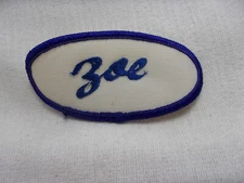 Z0E USED EMBROIDERED VINTAGE SEW ON NAME PATCH TAGS OVAL BLUE ON WHITE