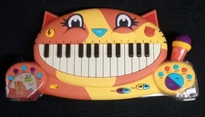 Complete! My B.Toys Meowsic Singing Orange Cat Piano Keyboard w/ Microphone