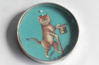 JOUET MECANIQUE A CLE CHAT QUI TRICOTE