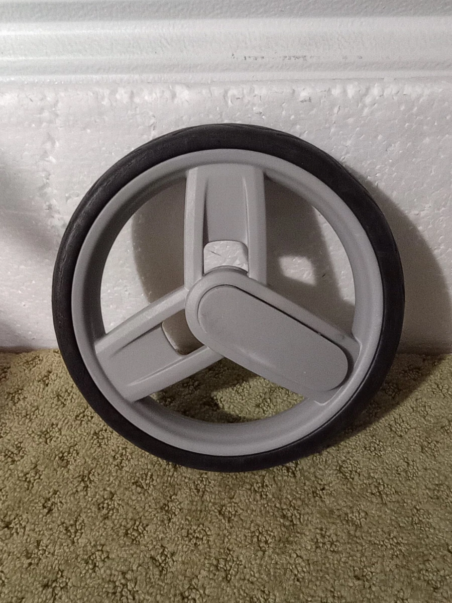 Disney Minnie Cosco Dorel Juvenile Stroller rear wheel only. Size 7 7 8
