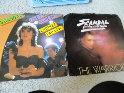 2 45 RPM SCANDAL ,THE WARRIOR,ANOTHER BAD LOVE ,VG+RECORDS