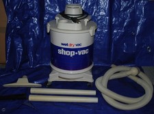 SHOP VAC WET-DRY CANISTER VACUUM MODEL 600A W/WHEELS & ATTACHMENTS - WORKS GREAT