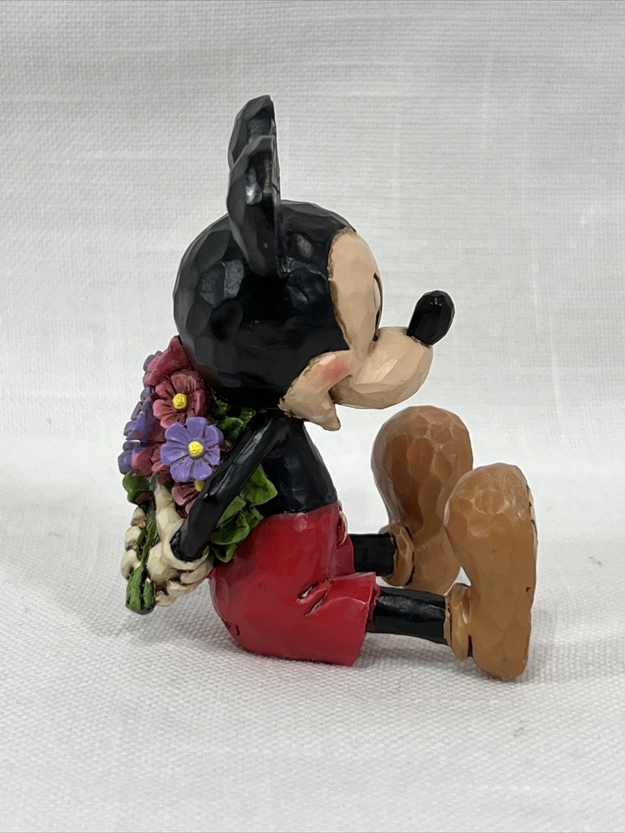 Mickey Mouse Holding Flowers