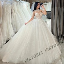 Illusion Long Sleeve Lace Floral Glitter Tulle Ballgown Wedding Dress With Train