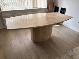 Travertine dining table comfortable 6 seater in excellent condition.