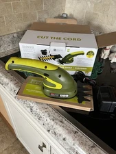 Sunjoe 2 in 1 Cordless grass shears and shubber.