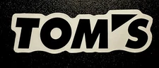 TOM’S Racing Sticker *Matte*Black Finish. Aprox Size: 3.5”x1”inch. Self Adhesive
