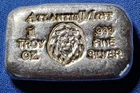 A Atlantis Mint LION- 1 oz .999 Fine Silver Hand Poured Bar