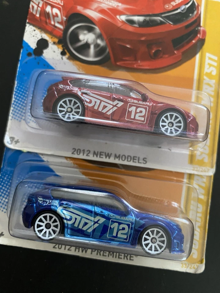 Hot Wheels 2012 nuevos modelos Subaru WRX STI (azul) y versión roja muy buen estado Foto 2 de 2