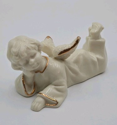 Angel Laying Down   Porcelain Formalities Collection  Baum Brothers
