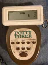 Vintage RecZone Potty Poker Electronic Handheld LCD Game Key Chain