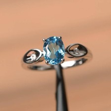 1.20Ct Lab-Created Blue Topaz Three-Stone Engagement Ring 14K White Gold Plated