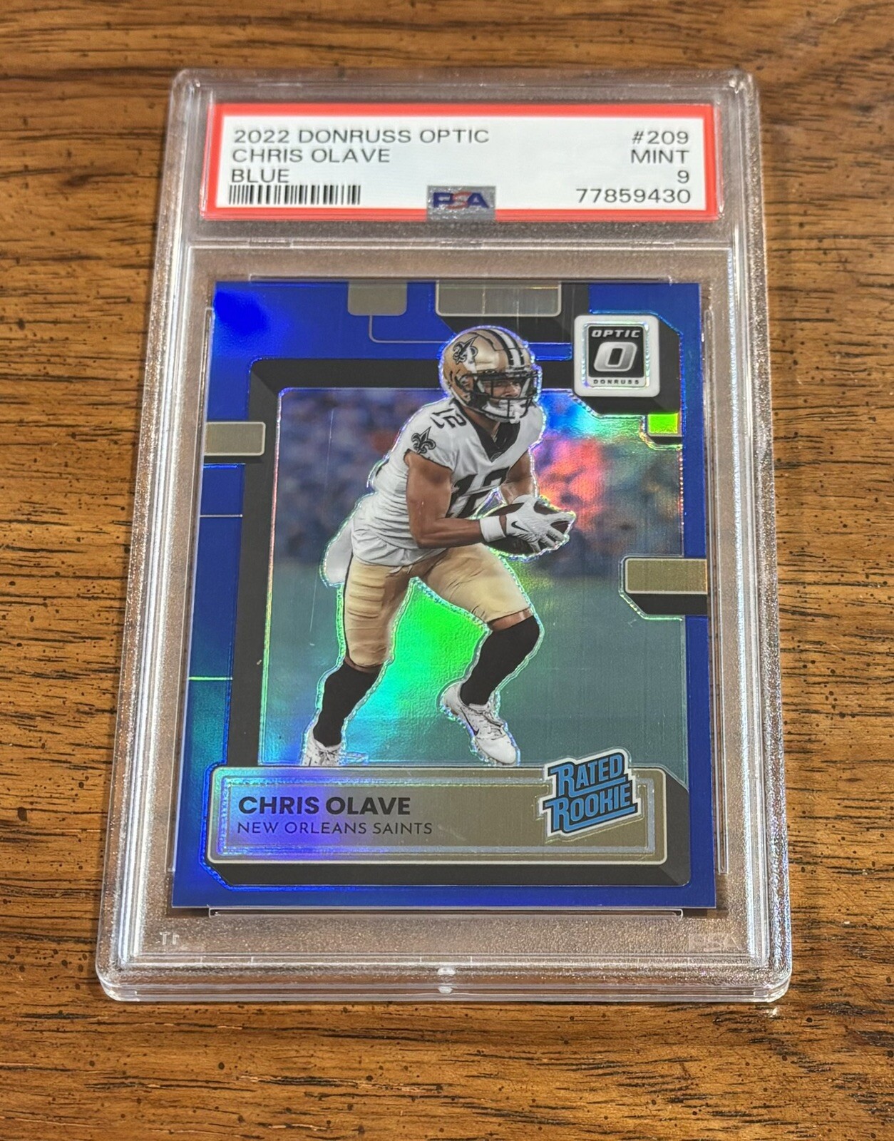 CHRIS OLAVE 2022 Donruss Optic #209 RC Blue /179 PSA 9 New Orleans Saints Rookie