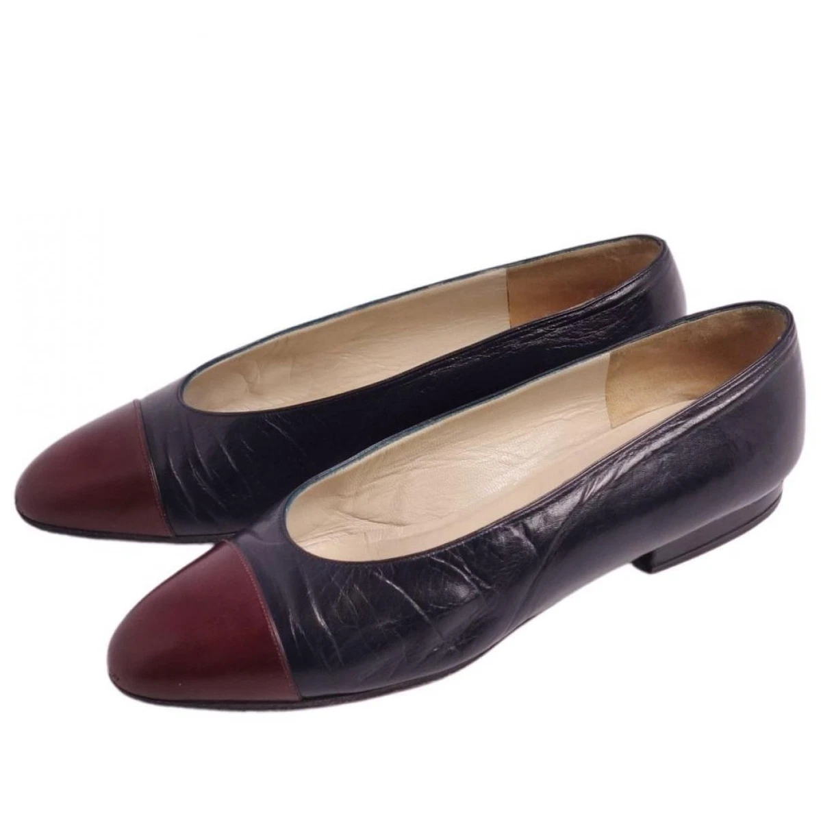 Vintage Chanel women's cap toe leather flat pumps in navy